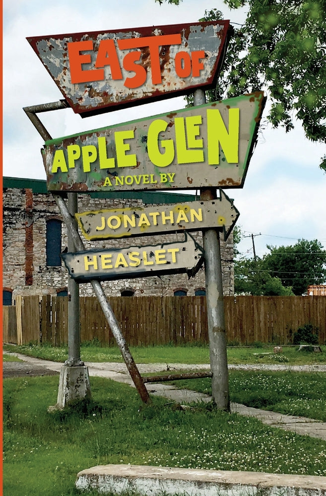 Book cover of 'East of Apple Glen' by Jonathan Heaslet with a worn-out sign design.